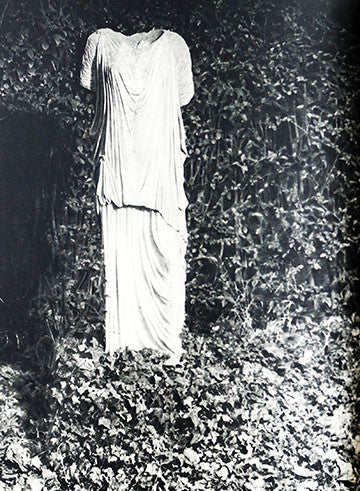 An invisible body appears to be standing in a white outfit in a photograph featured in Verve Book 3.